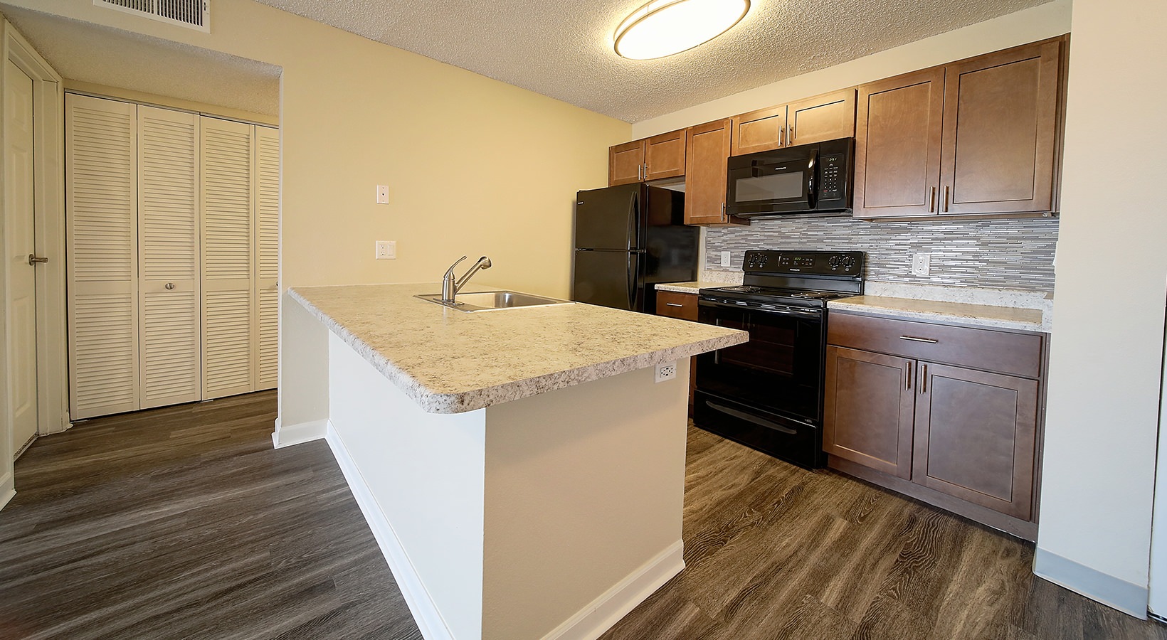 Kitchen Open kitchen and living room with plenty of natural light.