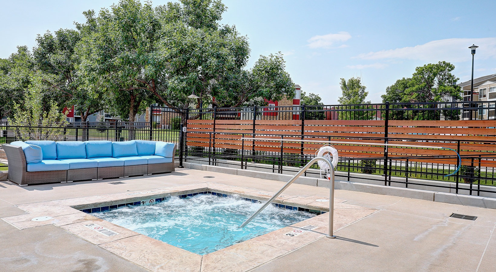 Hot Tub Hot tub and pool with plenty of outdoor seating.